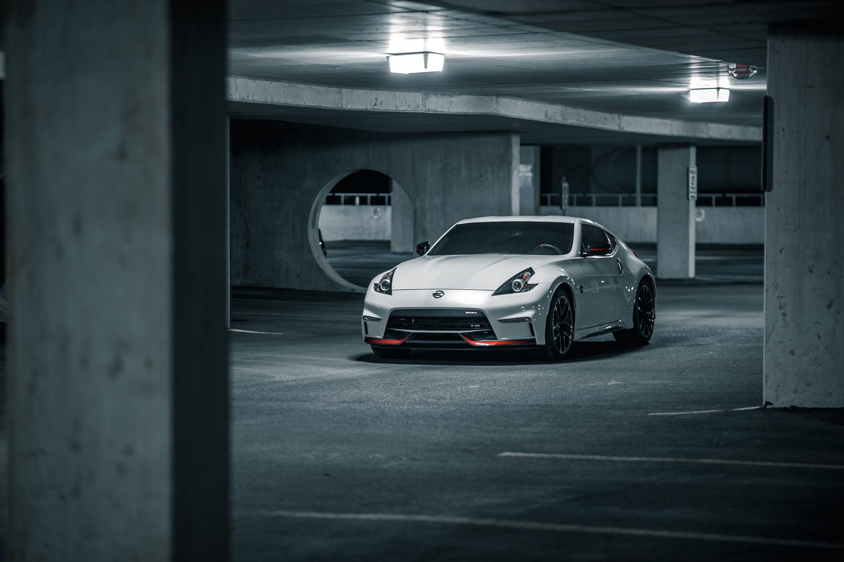 Modern luxury car driving on parking lot